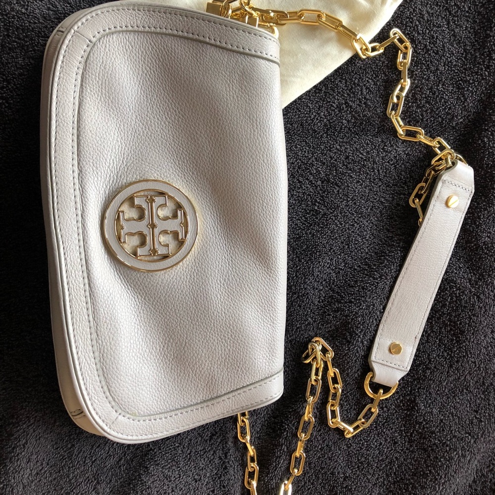periwinkle TORY BURCH purse with gold chain.
